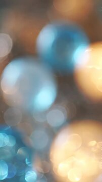 A Captivating Display of Colorful Bokeh Lights Featuring Dotted Blue and Golden Orbs, Creating an Ethereal and Dreamlike Background