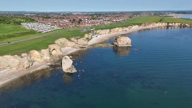 Drone View of Marsden Rock Sea Stack and Limestone Cliffs on the North Sea Coast