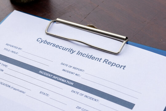 Cybersecurity Incident Report Close Up on Clipboard