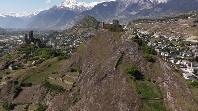 Tourbillon Castle ruins in Sion, Switzerland Rhone valley, aerial drone landscape nature