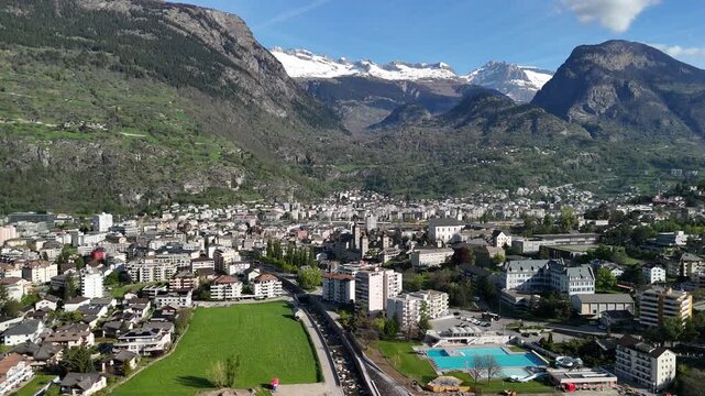 Brig Swiss holiday town below Alps Switzerland aerial drone landscape Simplon Pass
