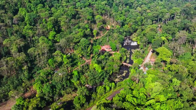 mukkodlu village with Kote Abbey Waterfalls, trees and independent house at coorg, Madikeri, karnataka, india. day time, push back shot, drone shot, 4k.