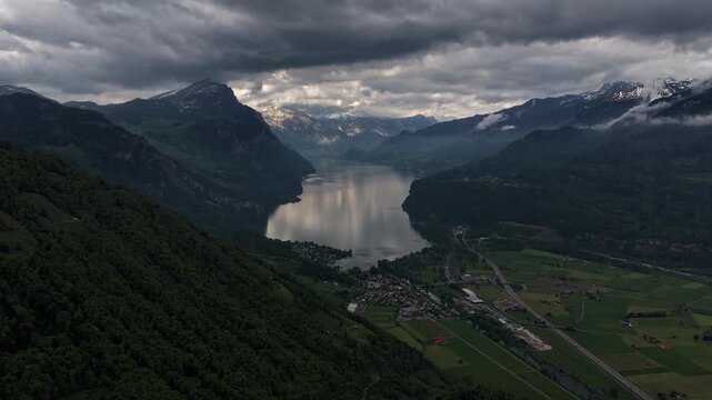 Switzerland nature dramatic landscape Lake Walen valley Glarus Alps aerial timelapse