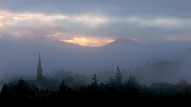 Timelapse of Sun Rising Through Mist Surrounding Eildon Hills, Galashiels, Scottish Borders