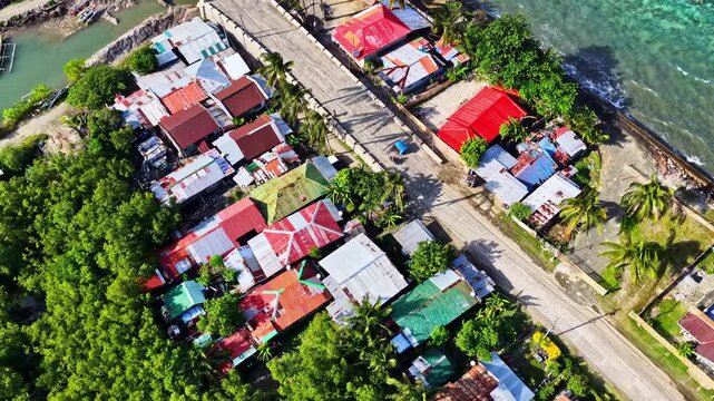 Small coastal town in Padre Burgos, Southern Leyte, Philippines in aerial view