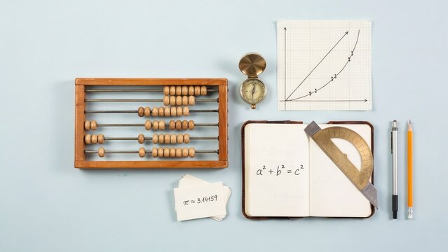 Mathematics tools and equipment laid out on a table for learning