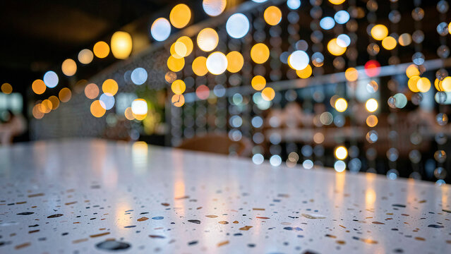Terrazzo Tabletop With Embedded Marble Flecks on Chic Rooftop Lounge with Ambient Warm Uplighting Lu