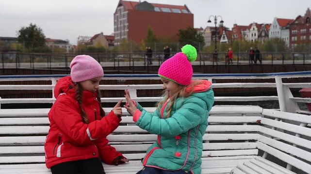 Two sisters go on tourist boat on Vistula River
