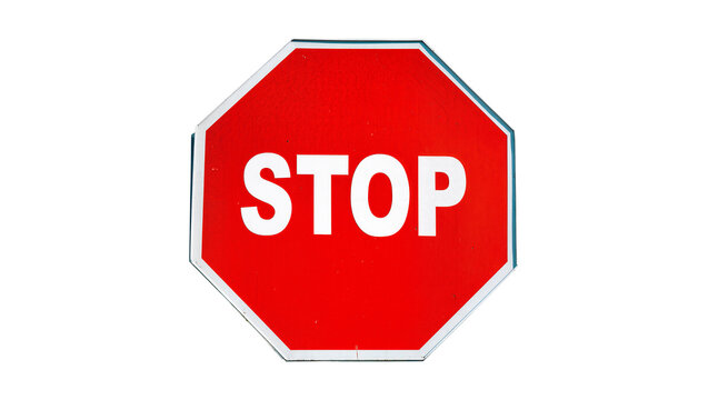 Red octagonal stop sign with white border and text
