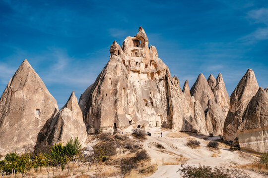Cappadocia, Turkey - November 03 2025: Ancient rock-cut cave dwellings and fairy chimneys