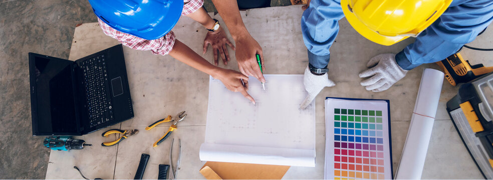 Banner construction engineer office desk architect workplace. Diversity Coworker Engineer team hands partnership. Support team greeting teamwork colleagues with copy space. Banner Teamwork Warehouse