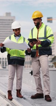 Construction, tablet and people with blueprint on rooftop for building inspection, layout and planning. City, team and workers with tech, papers and floorplan for engineering, maintenance and project