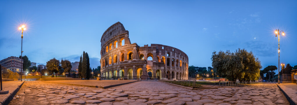 Panoramic view of the Colosseum at night, Rome, Italy