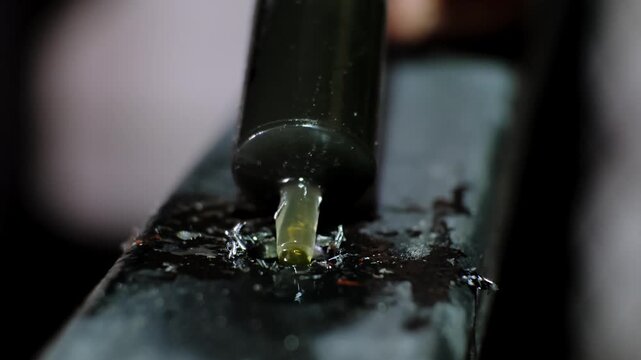 Lubricate with oil from a syringe before drilling a hole in the metal. Details of Industrial process. B-roll. High quality 4k footage.