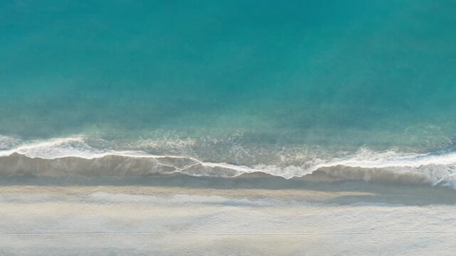 Aerial closeup of sea waves and foam