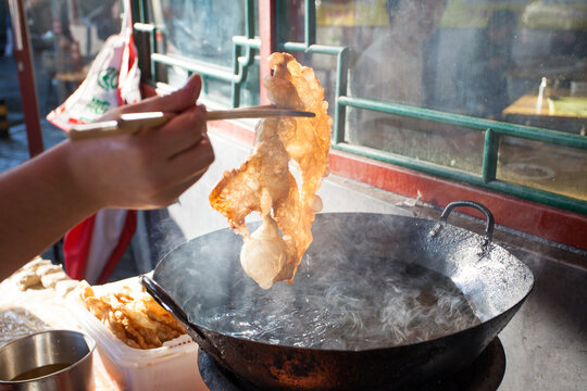 Street food in China: fried tortilla, Beijing, China