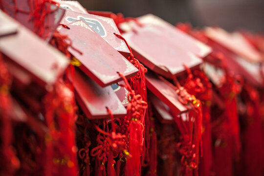 Many red prayer tablets displayed in a Buddhist temple, Pingyao, Shanxi, China