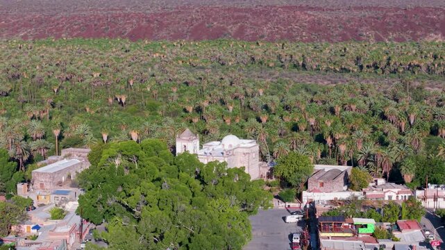Discover the Mission Church in San Ignacio, Baja California Mexico with aerial views of the surrounding oasis and natural beauty.