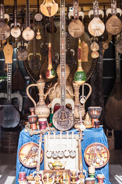 Old guitars for sale in a traditional antiques shop, Kashgar, China