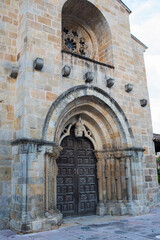 Fototapeta premium Beautiful entrance to church of Santa Maria de la Oliva at Villaviciosa, Asturias, Spain.