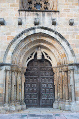 Fototapeta premium Main entrance to church of Santa Maria de la Oliva at Villaviciosa, Asturias, Spain.