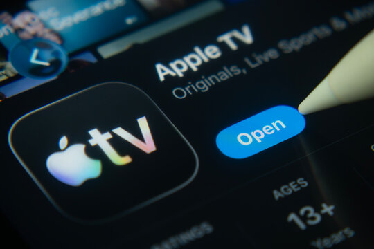 Dhaka, Bangladesh- 01 Dec 2025: A close-up of the Apple TV app icon in the App Store on an iPad screen.