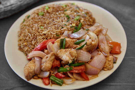 Fresh from the Pacific to the plate &mdash; a generous, sizzling serving of pescado saltado M&aacute;ncora style, where tender chunks of locally caught fish are wok-tossed with sweet red onions, ripe tomatoes.