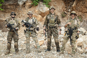Naklejka premium Military special forces soldier team in combat operation, tactical military portrait in action