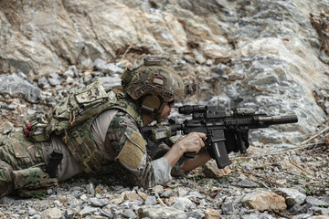 Naklejka premium US Special forces soldiers engaged in combat operation, tactical military team in action
