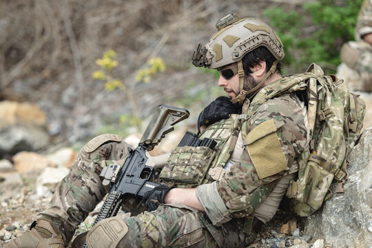 Military special forces soldier team in combat operation, tactical military portrait in action