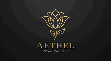 Fototapeta premium Luxury gold lotus flower logo design for botanical brand on dark charcoal background