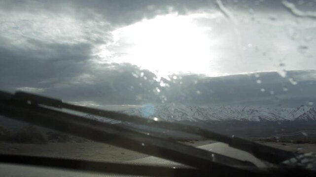 POV Driving Towards Andes Mountains Using Windshield Wipers At Dawn 