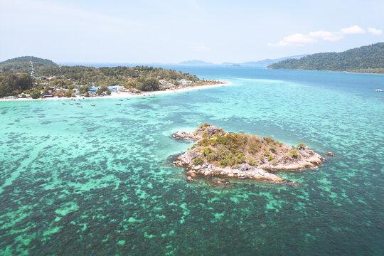 Aerial Drone View of Koh Lipe Island Beach with Turquoise Water and Longtail Boats, Thailand