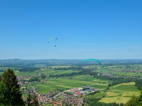germany, inspiring mountain flight launch area with lake views and flourishing alpine nature