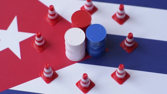 The cargo container ban on the Cuba flag as a conceptual backdrop for the export and logistics of goods. The cargo container embargo on the Cuban flag as a backdrop for your design