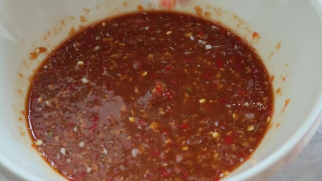 Make the seafood dipping sauce in a container.
