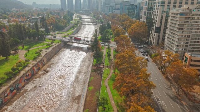 Drone Dolly In Over Mapocho River and Santiago de Chile Cityscape in High Frame Rate