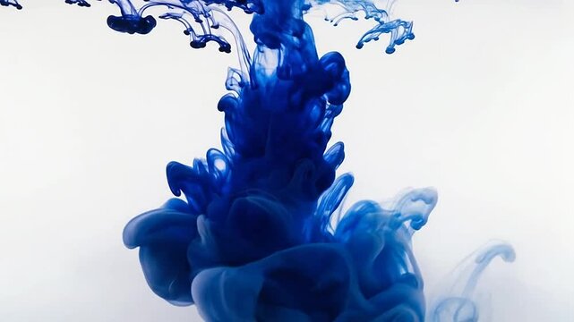 Blue ink cloud swirling in clear water against white.