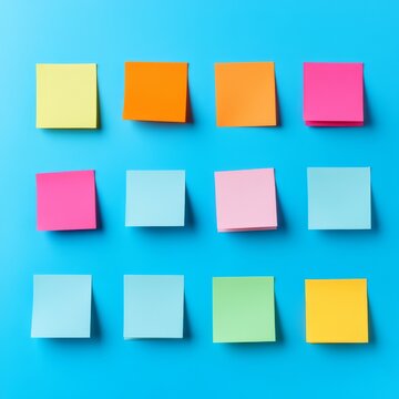 Vibrant 3x4 Grid 12 Multicolored Blank Sticky Notes neatly arrayed on Bright Blue. Ideal visual for organization, planning and creative ideas. Office, Stationery