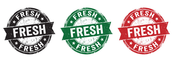 Obraz premium Set of three grunge rubber stamps with the word fresh in black, green and red colors