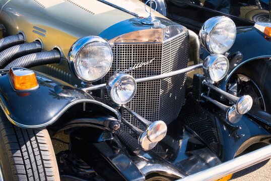 Raanana, Israel, January 20, 2024.Exhibition of vintage collectible cars, Excalibur SS Roadster Studebaker  retro car, front view of an american classic car.