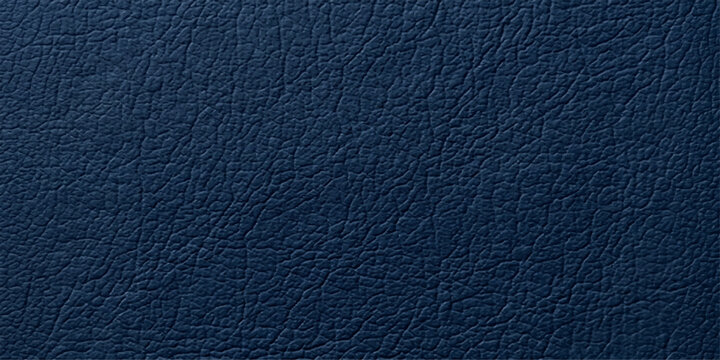A close-up macro photograph reveals the rich texture of a deep navy blue leather surface, showcasing its natural grain and subtle sheen, offering a tactile and luxurious feel.