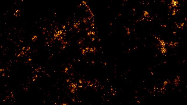 Abstract glowing fire embers and sparks floating on black background. Seamless animated texture of burning ash, hot lava, and fiery particles for transition effects.