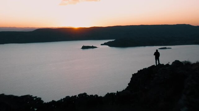Drone view of ancient agricultural terraces overlooking Lake Titicaca on Isla del Sol, one of Bolivia&rsquo;s most iconic cultural landscapes.