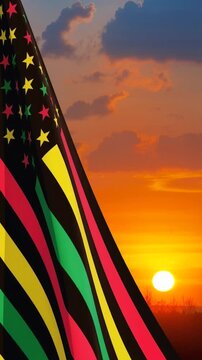 Alternative Juneteenth Flag with sunrise or sunset. Since 1865. Design of Banner with place for text. Vertical video for social media and stories.