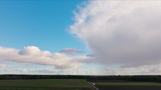 Sideways drone movement from Nigrande Latvia with Lithuanian turbines beyond
