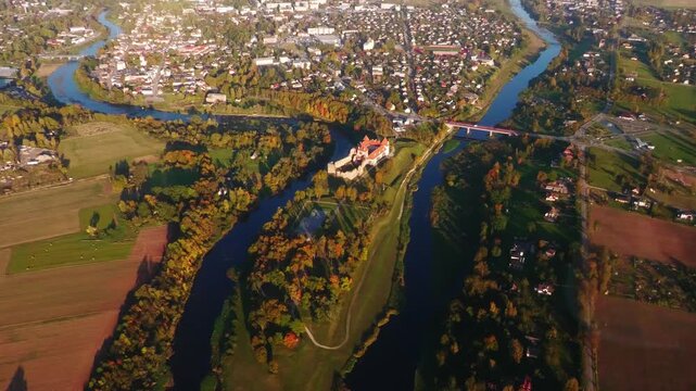 Aerial View of Bauska Castle and River Confluence During Autumn in Latvia