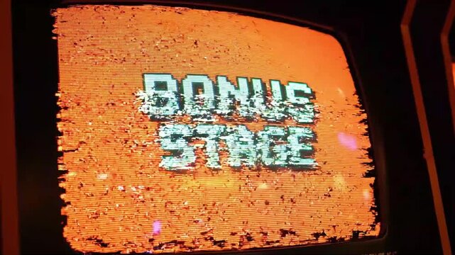 Bonus stage arcade text flickering on an old retro television screen display featuring vintage digital glitch motion video effects