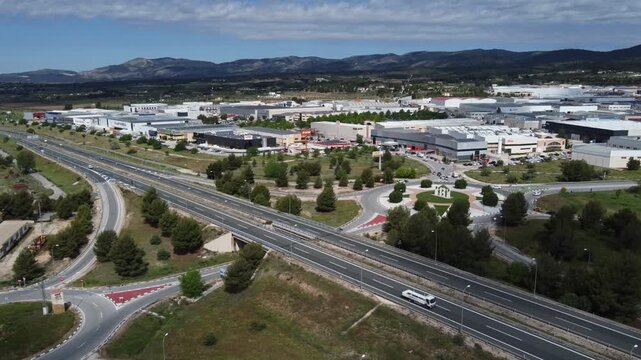 Static aerial view to the entrance of the Alfa&ccedil; industrial area and A-7 motorway. Located in Ibi, Spain.