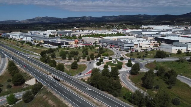 Flying over the A-7 motorway while revealing the Alfa&ccedil; industrial area.